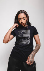 Load image into Gallery viewer, Ladies I Am The Hustle Flag Tee – Eclipse (Black/Black)
